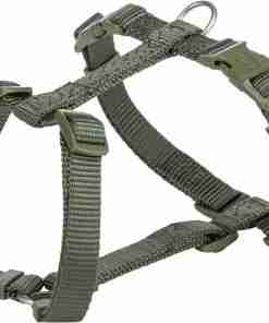 Green tactical dog harness with adjustable straps and a front D-ring for leash attachment