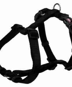 Black adjustable dog harness with metal leash rings and quick-release buckles, shown in a three-quarter view down a white background, designed for secure control of a dog