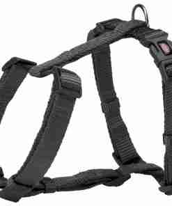 Black adjustable dog harness with metal D-ring for leash and quick-release buckles on the straps