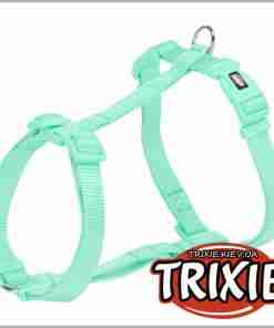 Mint green adjustable dog harness with a metal leash ring against a white background (Trixie logo)