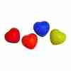 Four colorful heart shapes (red, blue, red, and yellow-green) arranged diagonally on a white background.